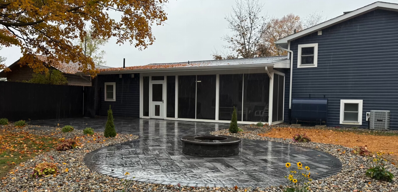 Custom concrete patio with fire pit in Westchester, FL